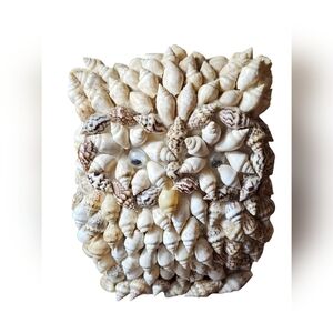 Vintage seashell owl figurine.